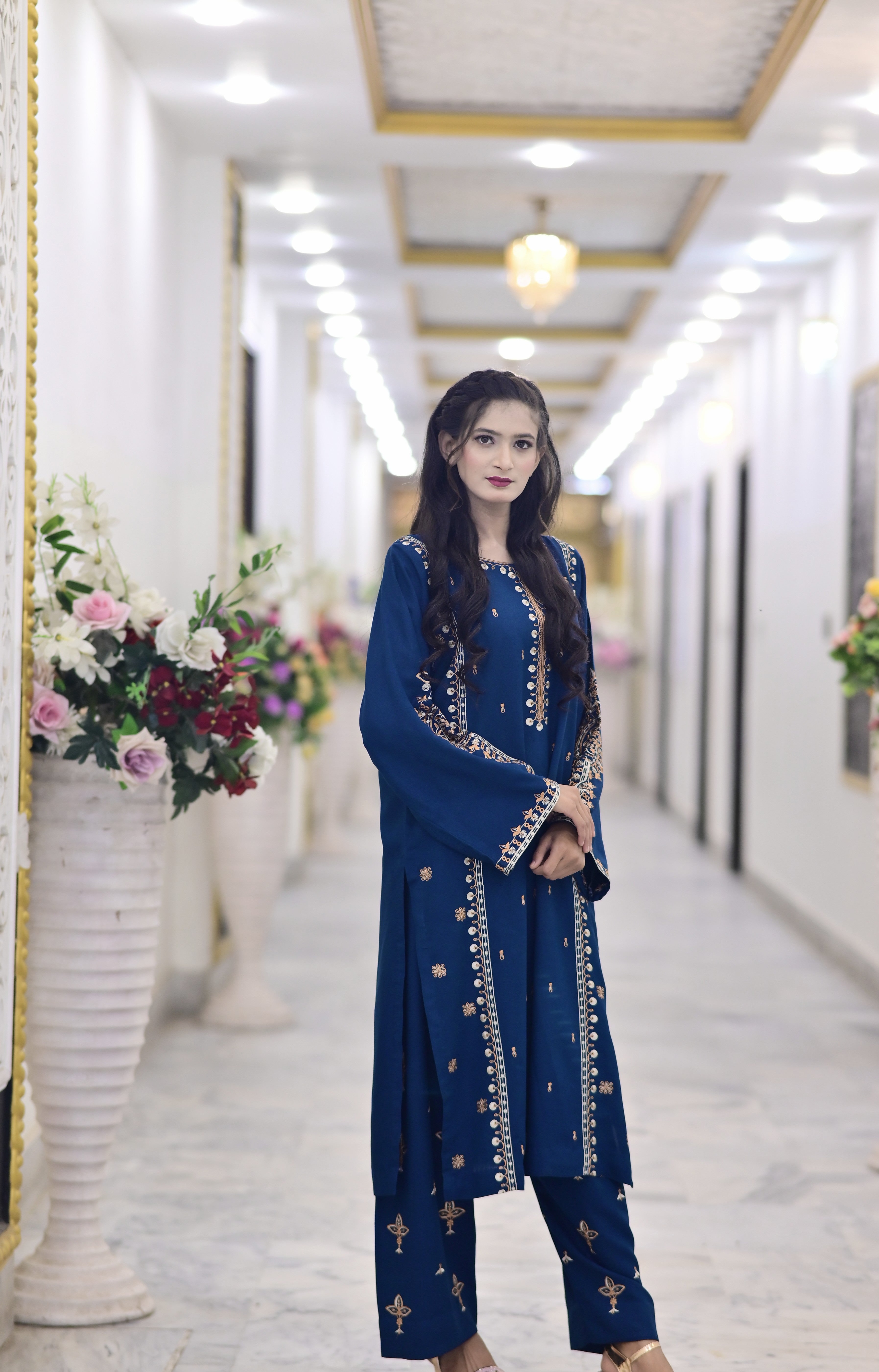 2PC Karndi  Embroidered Suitlong shirt adorned with intricate embroidery on the front and detailed embroidery on loose sleeves