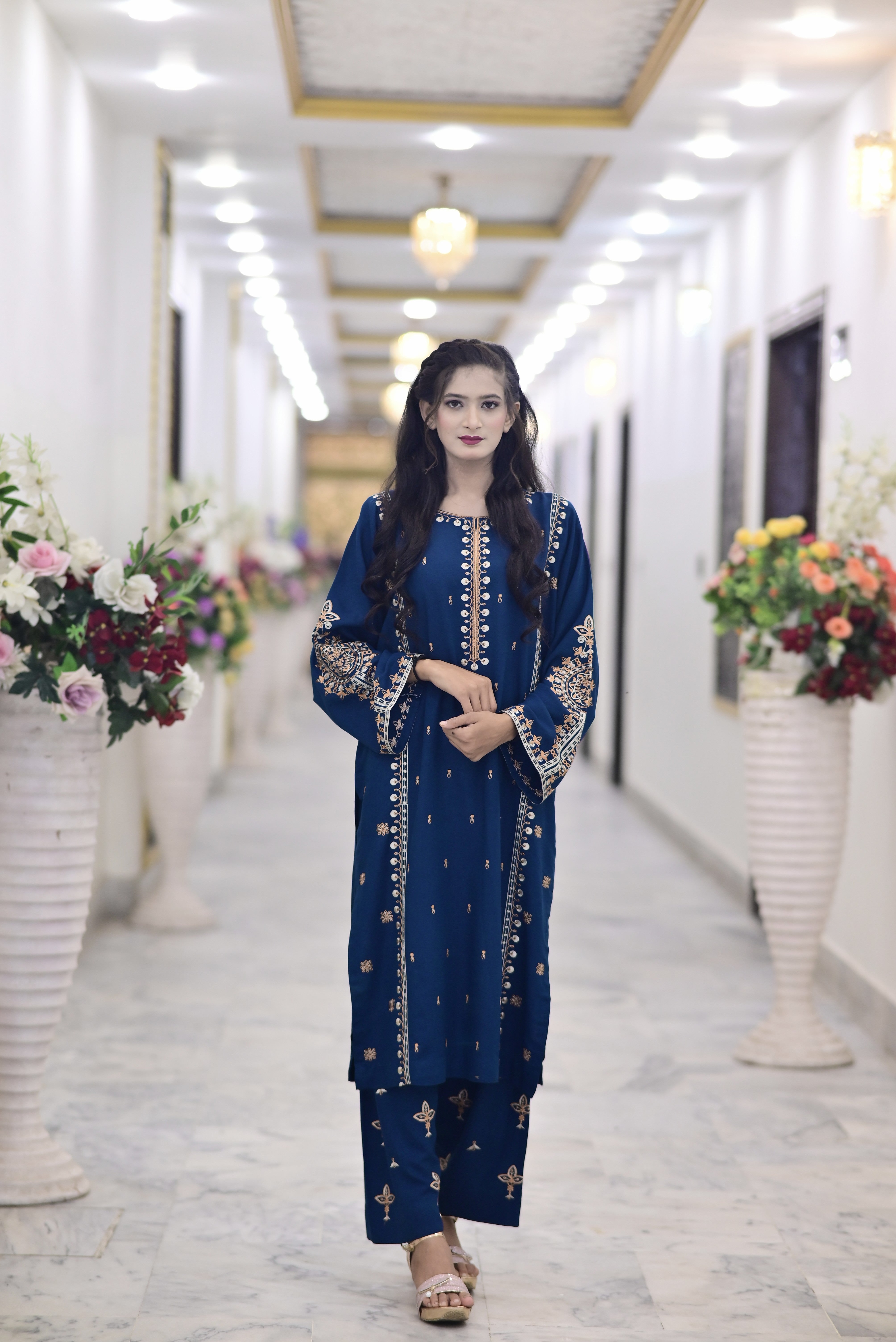 2PC Karndi  Embroidered Suitlong shirt adorned with intricate embroidery on the front and detailed embroidery on loose sleeves