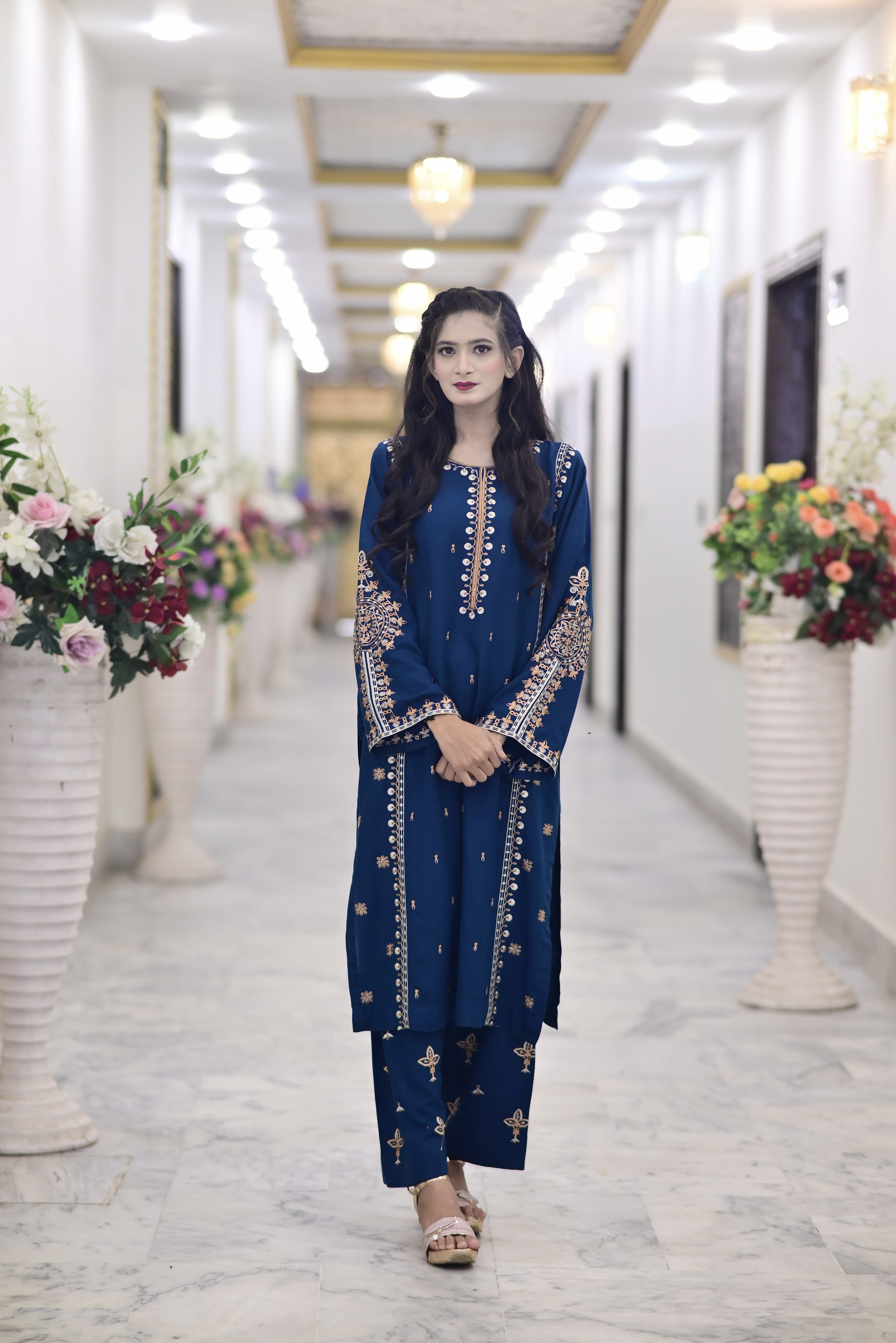 2PC Karndi  Embroidered Suitlong shirt adorned with intricate embroidery on the front and detailed embroidery on loose sleeves