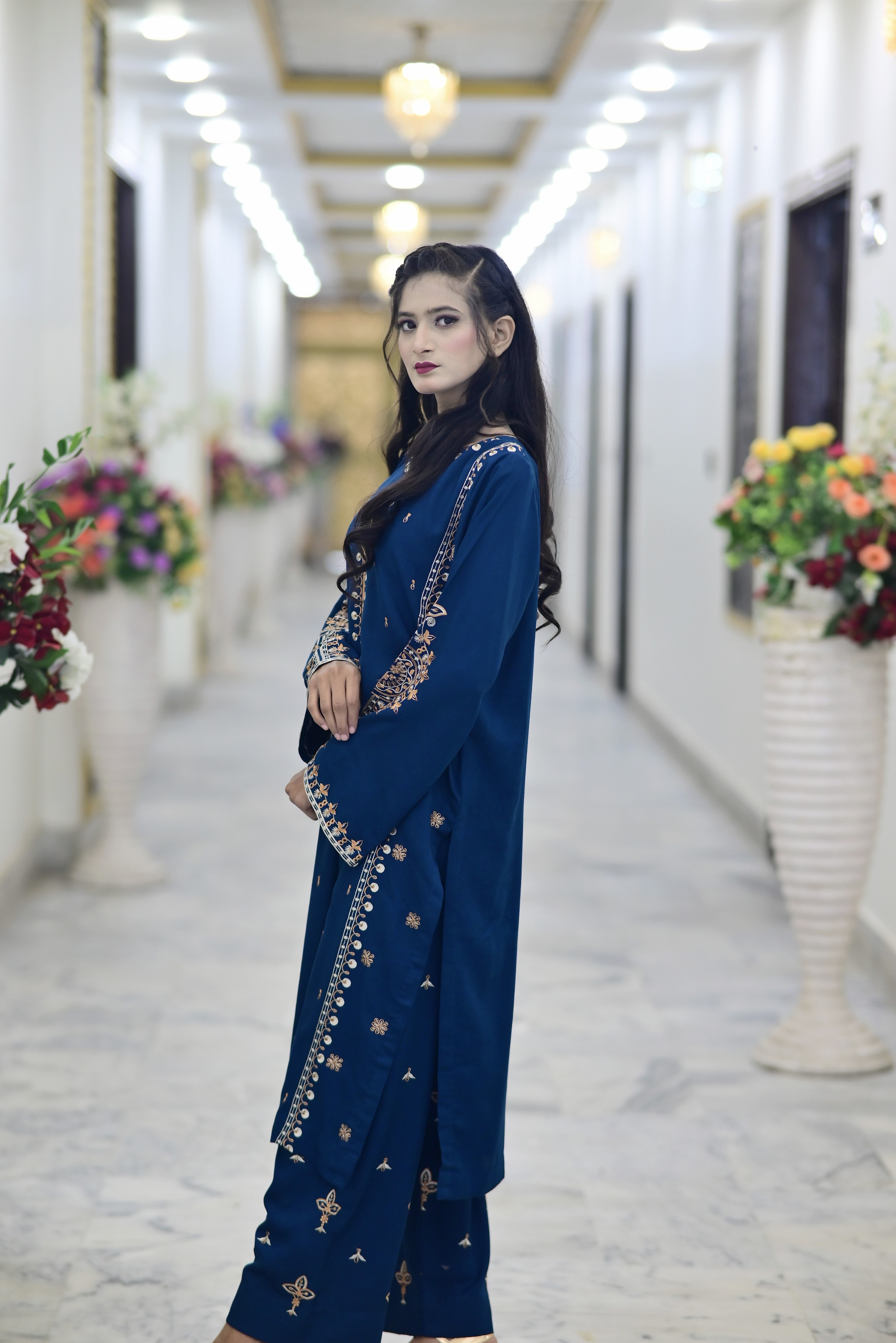 2PC Karndi  Embroidered Suitlong shirt adorned with intricate embroidery on the front and detailed embroidery on loose sleeves