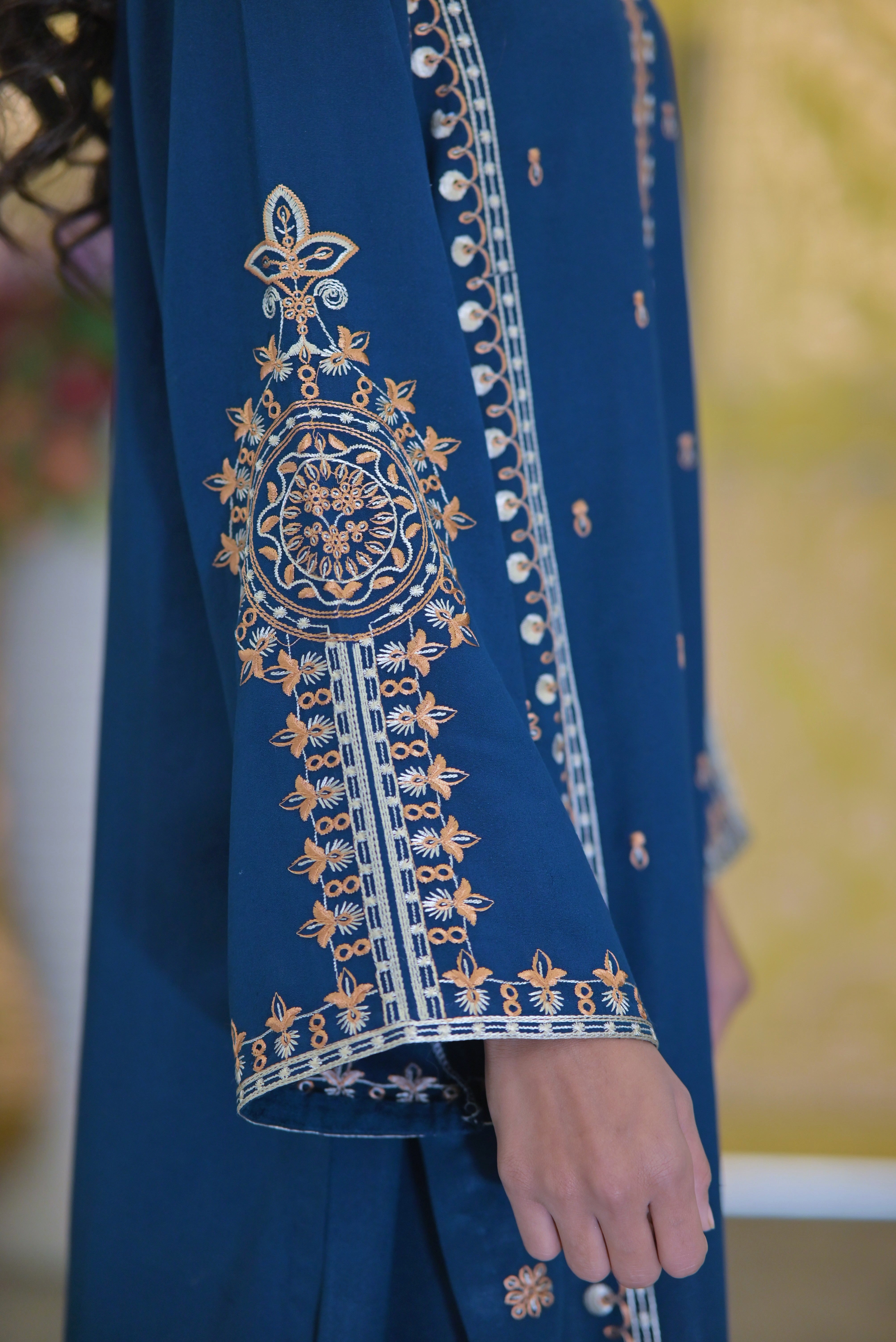 2PC Karndi  Embroidered Suitlong shirt adorned with intricate embroidery on the front and detailed embroidery on loose sleeves