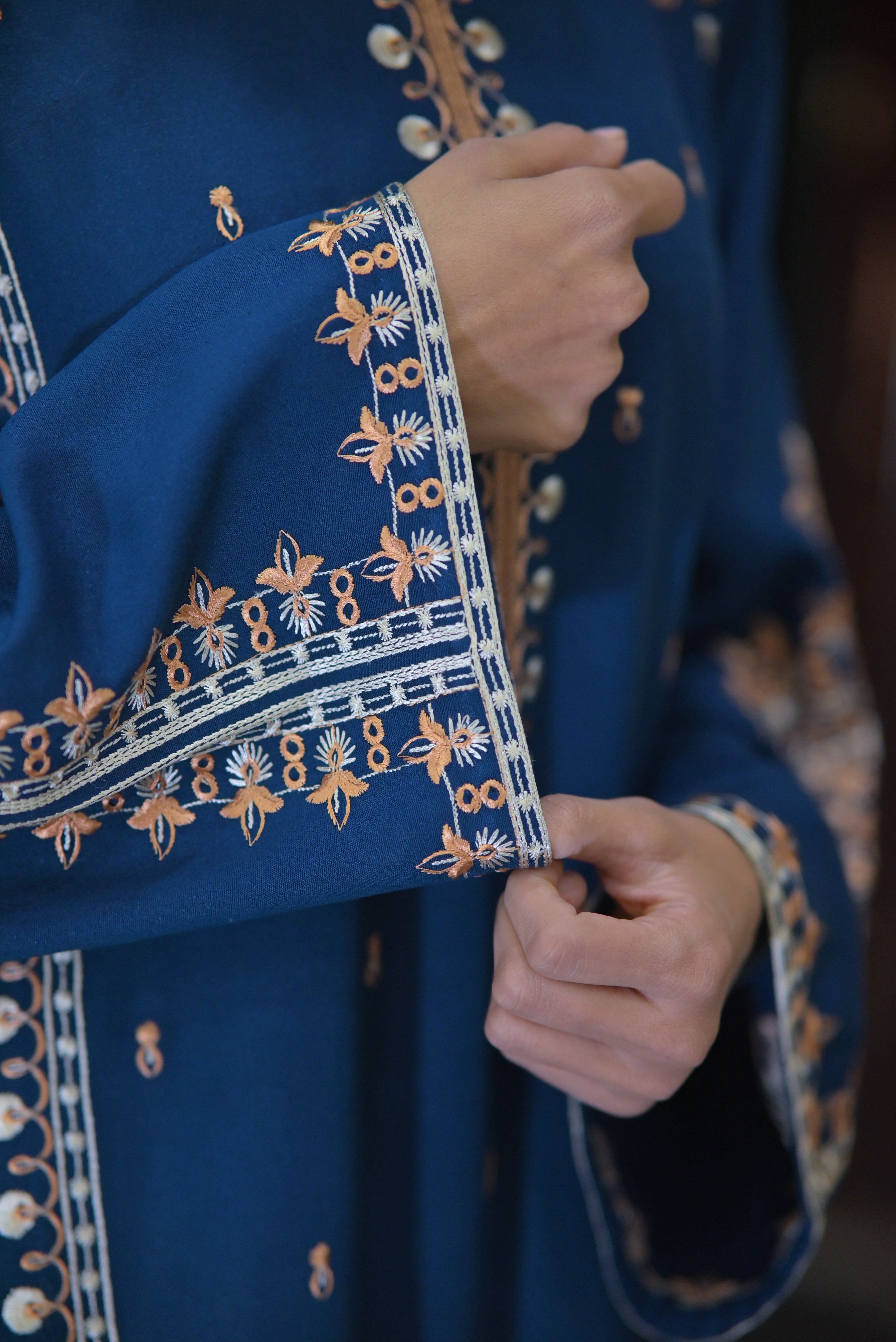 2PC Karndi  Embroidered Suitlong shirt adorned with intricate embroidery on the front and detailed embroidery on loose sleeves