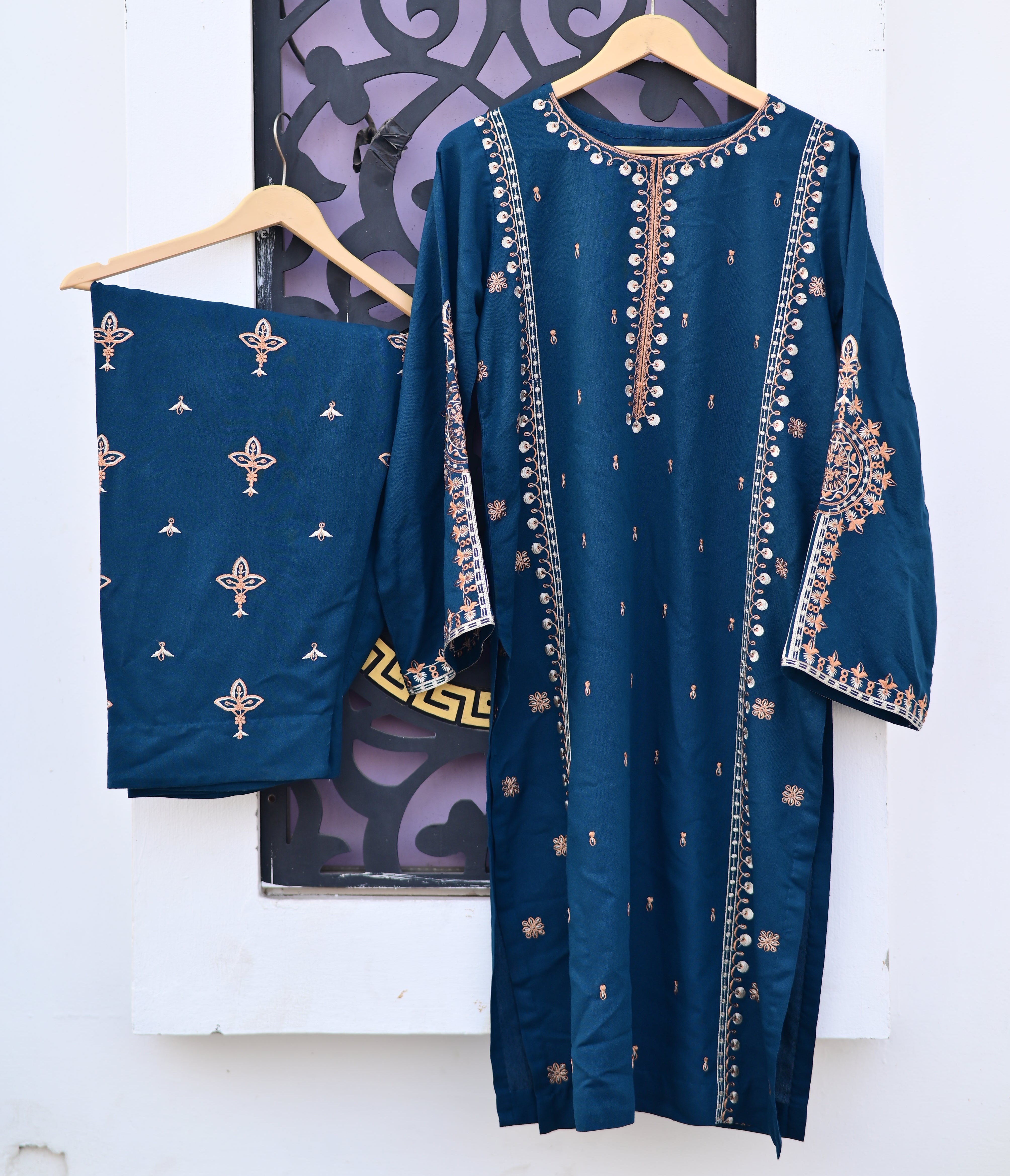 2PC Karndi  Embroidered Suitlong shirt adorned with intricate embroidery on the front and detailed embroidery on loose sleeves
