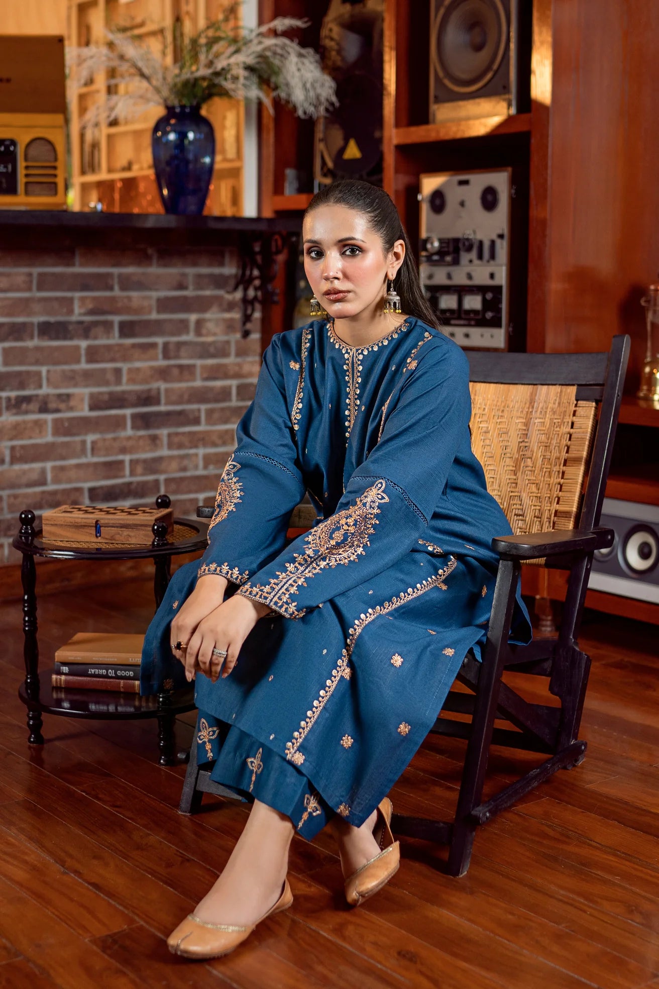 2PC Khaddar Embroidered Suitlong shirt adorned with intricate embroidery on the front and detailed embroidery on loose sleeves